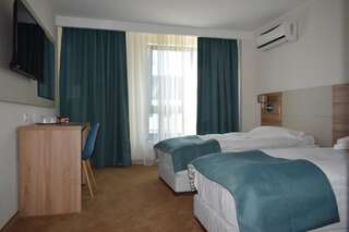 Отель Hotel Regal Брашов Двухместный номер с 2 отдельными кроватями-3